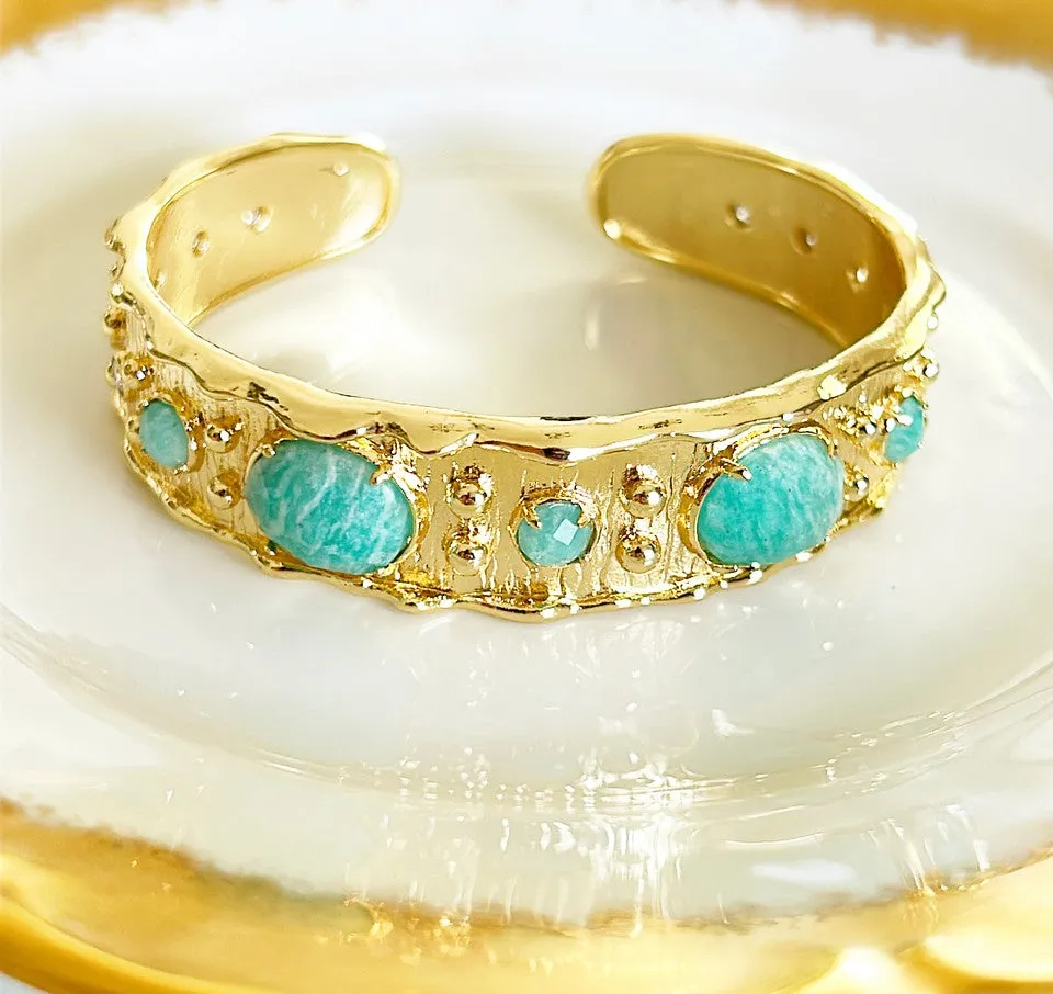 Designer style cuff bracelet with faux turquoise stone accents